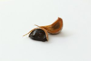 single clove of black garlic 
